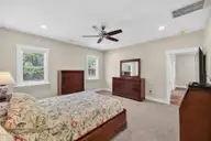 460 Summerhouse Drive, Holly Ridge, NC 28445 — 4-bedroom home in Summerhouse On Everett Bay, Holly Ridge, NC, photo 13 of 73: primary bedroom