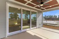 119 Windswept Lane, Beaufort, NC 28516 — 3-bedroom home in Beaufort Club, Beaufort, NC, photo 22 of 42: Screened Porch Overlooking Golf Course