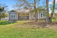 1812 Sandalwood Drive SW, Ocean Isle Beach, NC 28469 — 3-bedroom home in Lake Tree Shores, Ocean Isle Beach, NC, photo 1 of 65: 1812 Sandalwood Drive SW