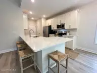 9081 National Avenue NE, Leland, NC 28451 — 4-bedroom home in Parkwood Estates, Leland, NC, photo 5 of 29: Kitchen