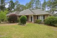 214 Longleaf Drive, West End, NC 27376 — 3-bedroom home in Seven Lakes West, West End, NC, photo 2 of 49: Front
