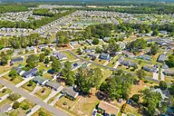 836 Nicholas Drive SW, Calabash, NC 28467 — 3-bedroom manufactured home in Village At Calabash, Calabash, NC, photo 8 of 61: 60_dji_0739_pin