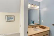 579 Coral Ridge Road, Pine Knoll Shores, NC 28512 — 4-bedroom waterfront home in Beacon's Reach, Pine Knoll Shores, NC, photo 23 of 62: Upstairs Powder Room