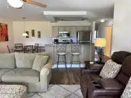 330 S Middleton Drive NW Unit 505, Calabash, NC 28467 — 2-bedroom waterfront condo in Brunswick Plantation, Calabash, NC, photo 22 of 72: 505 living room - Copy