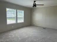 316 Commodore Drive, Rocky Mount, NC 27801 — 3-bedroom manufactured home in Eastfield, Rocky Mount, NC, photo 12 of 32: Master Bedroom view 1