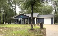 669 Pelican Circle, Bolivia, NC 28422 — 3-bedroom waterfront home in River Run Plantation, Bolivia, NC, photo 1 of 25: Front view