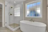 6830 Fellowship Drive, Leland, NC 28451 — 5-bedroom home in Grand Park, Leland, NC, photo 19 of 49: Primary Bath