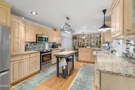 415 Hillcrest Drive, Morehead City, NC 28557 — 4-bedroom home in Brandywine Bay, Morehead City, NC, photo 10 of 61: Kitchen with granite countertops