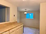 218 Pamlico Drive, Washington, NC 27889 — 3-bedroom home in Pamlico Village, Washington, NC, photo 17 of 38: Kitchen & Breakfast Area