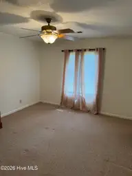 515 Fairway Drive W, Sunset Beach, NC 28468 — 3-bedroom home in Sea Trail Plantation, Sunset Beach, NC, photo 20 of 25: Master Bedroom