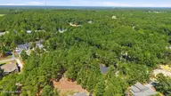 112 5421 Ritter Drive, Seven Lakes, NC 27376 — waterfront lot in Seven Lakes West, Seven Lakes, NC, photo 10 of 29: 8-web-or-mls-DJI_20260825143507_0516_D