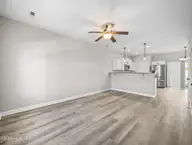 6 Outrigger Drive, Swansboro, NC 28584 — 2-bedroom townhome in The Hammocks at Port of Swansboro, Swansboro, NC, photo 3 of 52: Living Room