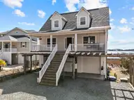 1039 Chadwick Shores Drive, Sneads Ferry, NC 28460 — 3-bedroom waterfront home in Chadwick Shores, Sneads Ferry, NC, photo 3 of 59: DJI_20260301115640_0111_D