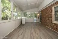 1020 Ridgemeadow Lane, Rocky Mount, NC 27803 — 3-bedroom home in Shadow Ridge, Rocky Mount, NC, photo 16 of 35: Sunroom