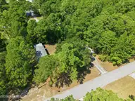140 Lousan Drive, Cape Carteret, NC 28584 — 3-bedroom home, Cape Carteret, NC, photo 8 of 50: 11-print-DJI_20260826144253_0006_D
