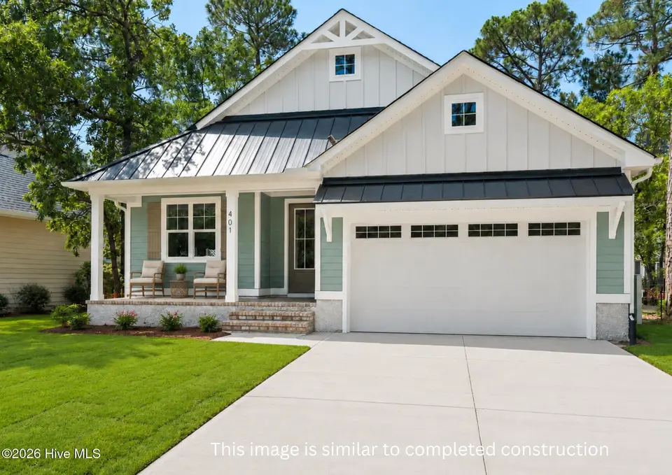 401 Blossom Tree Lane SE, Bolivia, NC 28422 — 3-bedroom home in Winding River Plantation, Bolivia, NC, photo 1 of 69