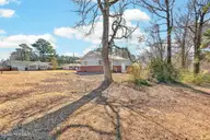 209 Cardinal Road, Jacksonville, NC 28546 — 3-bedroom home in Cardinal Village, Jacksonville, NC, photo 23 of 26: Yard