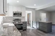 255 Foxcroft Road, Whispering Pines, NC 28327 — 3-bedroom home, Whispering Pines, NC, photo 8 of 31: Kitchen with Stainless Steel Appliances