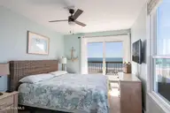 1509 Ocean Drive West, Emerald Isle, NC 28594 — 4-bedroom waterfront townhome in Emerald Isle By The Sea, Emerald Isle, NC, photo 8 of 26: 2 Seas the Day West 027 king with bath a