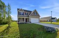 697 Poppleton Drive, Hampstead, NC 28443 — 4-bedroom home in Harrison Cove, Hampstead, NC, photo 3 of 46: 2_697_poppleton_dr_002