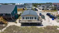 501 W Beach Drive, Oak Island, NC 28465 — 3-bedroom waterfront home in Long Beach, Oak Island, NC, photo 2 of 60