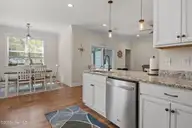 129 NW 11th Street, Oak Island, NC 28465 — 3-bedroom home in Pinners Point, Oak Island, NC, photo 12 of 63: kitchen-dining