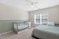 404 Hidden Oaks Drive, Jacksonville, NC 28546 — 3-bedroom home in Hunters Creek, Jacksonville, NC, photo 20 of 28: Serene nursery and bedroom blend