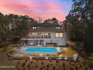2502 W Yacht Drive, Oak Island, NC 28465 — 4-bedroom waterfront home, Oak Island, NC, photo 13 of 50: 1-web-or-mls-DJI_20260224130745_0610_D_2