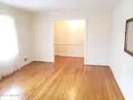 1113 Parkside Drive NW, Wilson, NC 27896 — 3-bedroom home in Forest Hills, Wilson, NC, photo 5 of 29: LIVING RM TO FOYER