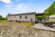 910 Beasleys Mill Road, Warsaw, NC 28398 — 3-bedroom manufactured home, Warsaw, NC, photo 14 of 22: 26_back exterior