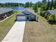 2021 Caracara Drive, New Bern, NC 28560 — 4-bedroom waterfront home in Fairfield Harbour, New Bern, NC, photo 1 of 65: 94-2021_Caracara-14