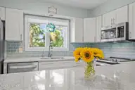 300 Mcginnis Drive, Pine Knoll Shores, NC 28512 — 3-bedroom waterfront condo in Mcginnis Point, Pine Knoll Shores, NC, photo 11 of 57: Kitchen Counters