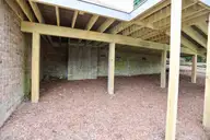 116 Shagbark Court, West End, NC 27376 — 3-bedroom waterfront home in Seven Lakes North, West End, NC, photo 17 of 65: View under Newer Trex Deck