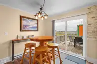 221 Bayview Drive, Harkers Island, NC 28531 — 2-bedroom waterfront home in Earl Davis, Harkers Island, NC, photo 15 of 53: Breakfast Nook
