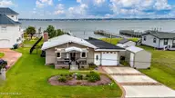 102 Shoreline Drive, Atlantic Beach, NC 28512 — 2-bedroom waterfront home in Bogue View Shores, Atlantic Beach, NC, photo 2 of 29: Front View