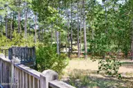 549 Lucas Road, West End, NC 27376 — 3-bedroom waterfront home in West End, West End, NC, photo 15 of 43: 549 Lucas Rd back porch view of golf cou