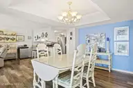 1505 Salter Path Road 412, Indian Beach, NC 28512 — 3-bedroom waterfront condo in Summer Winds Condominiums, Indian Beach, NC, photo 9 of 54: Dining Area to Living Area