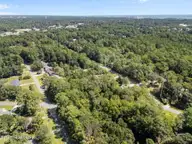 5610 23 Brittain Drive, Wilmington, NC 28409 — lot in Willow Woods, Wilmington, NC, photo 13 of 24: 20-web-or-mls-DJI_20250912121605_0794_D
