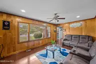 704 N Grace Avenue, New Bern, NC 28562 — 3-bedroom home in Trent Park, New Bern, NC, photo 12 of 46: Living room