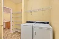 250 Woodlands Way Unit 14, Calabash, NC 28467 — 3-bedroom condo in Woodlands @ Crow Creek, Calabash, NC, photo 9 of 49: Laundry