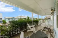 737 Fort Fisher Boulevard N, Kure Beach, NC 28449 — 4-bedroom waterfront home in Kure Estates, Kure Beach, NC, photo 3 of 53: 737FtFisherBlvdN-75