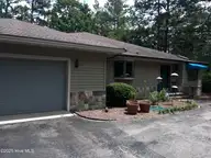 105 Longleaf Road, Southern Pines, NC 28387 — 2-bedroom home in Pine Needles, Southern Pines, NC, photo 2 of 29: frontll2