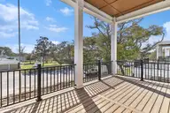 805 Mulberry Street 206, Beaufort, NC 28516 — 2-bedroom condo in 805 Mulberry, Beaufort, NC, photo 12 of 22: Covered Balcony Overlooking Mulberry
