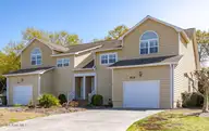 805 Sloop Pointe Lane, Kure Beach, NC 28449 — 3-bedroom townhome in The Keys at Kure Beach, Kure Beach, NC, photo 1 of 18: Front Ext 805 Sloop Pointe Ln