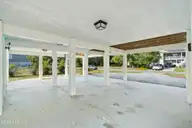 228 NE 52nd Street, Oak Island, NC 28465 — 3-bedroom home in Tranquil Harbor, Oak Island, NC, photo 8 of 61