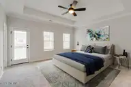 544 Heart Pine Avenue, Wilmington, NC 28411 — 5-bedroom home in Indigo at Abbey Preserve, Wilmington, NC, photo 7 of 9: Nottley Primary Bedroom