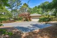 32 Bogie Drive, Whispering Pines, NC 28327 — 3-bedroom home in Whispering Pines, Whispering Pines, NC, photo 2 of 63: 04-5_32 Bogie Dr., WP_Exterior_Spring_LD