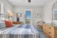 6707 Kings Lynn Drive, Oak Island, NC 28465 — 3-bedroom waterfront home in Kings Lynn, Oak Island, NC, photo 19 of 51: bed 3 3