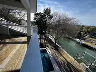 137 Beechwood Drive, Pine Knoll Shores, NC 28512 — 4-bedroom waterfront home in Pine Knoll Association, Pine Knoll Shores, NC, photo 8 of 10: 137 Beechwood