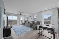 3802 Island Drive, North Topsail Beach, NC 28460 — 3-bedroom waterfront townhome in MFBostic, North Topsail Beach, NC, photo 14 of 49: Livingroom with ocean view